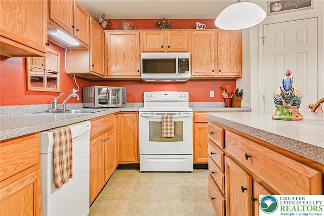 6780 Pioneer Dr, Lower Macungie Twp, PA 18062 - kitchen featuring white appliances and light countertops