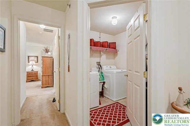 6780 Pioneer Dr, Lower Macungie Twp, PA 18062 - laundry room featuring light colored carpet and washer and dryer