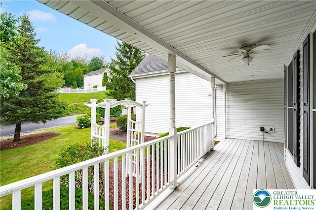 620 Pittston Ave, Luzerne, PA 18641 - wooden deck with a ceiling fan and a lawn