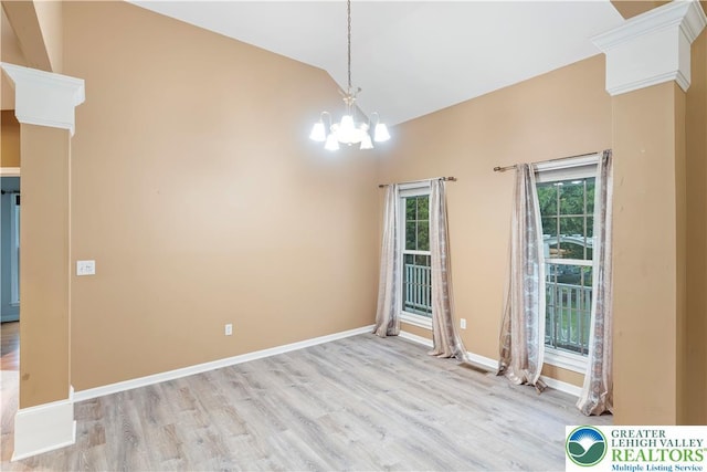 620 Pittston Ave, Luzerne, PA 18641 - unfurnished dining area with wood finished floors, a chandelier, and lofted ceiling