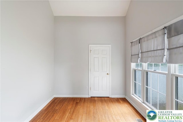 620 Pittston Ave, Luzerne, PA 18641 - unfurnished room featuring wood finished floors and vaulted ceiling