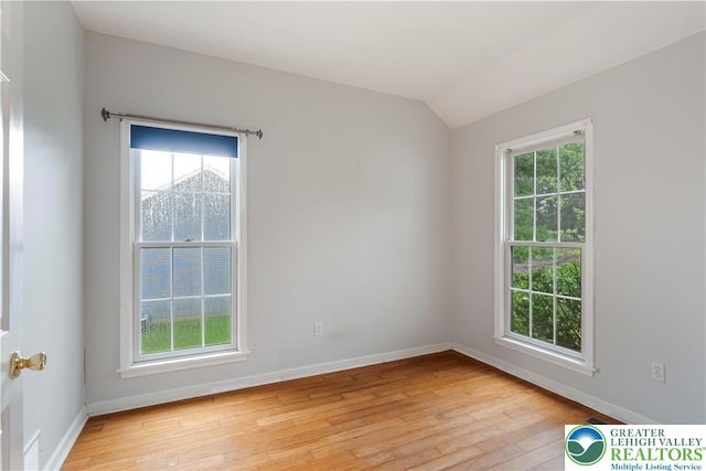 620 Pittston Ave, Luzerne, PA 18641 - empty room with light wood-style floors and vaulted ceiling