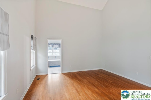 620 Pittston Ave, Luzerne, PA 18641 - empty room featuring light wood-style floors and high vaulted ceiling