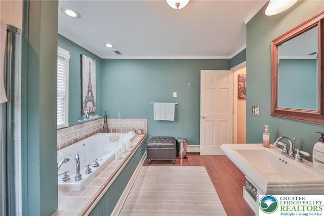 1812 Treeline Dr, Forks Twp, PA 18040 - full bathroom with a whirlpool tub, wood finished floors, a baseboard heating unit, crown molding, and recessed lighting