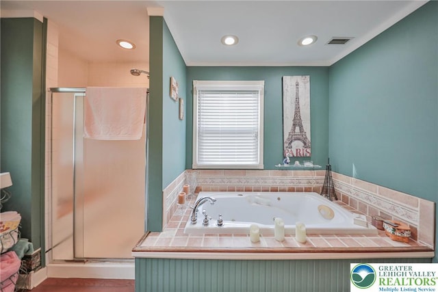 1812 Treeline Dr, Forks Twp, PA 18040 - bathroom featuring a shower stall, a tub with jets, and recessed lighting