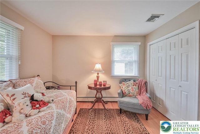 1812 Treeline Dr, Forks Twp, PA 18040 - bedroom featuring a closet, wood finished floors, and a baseboard radiator