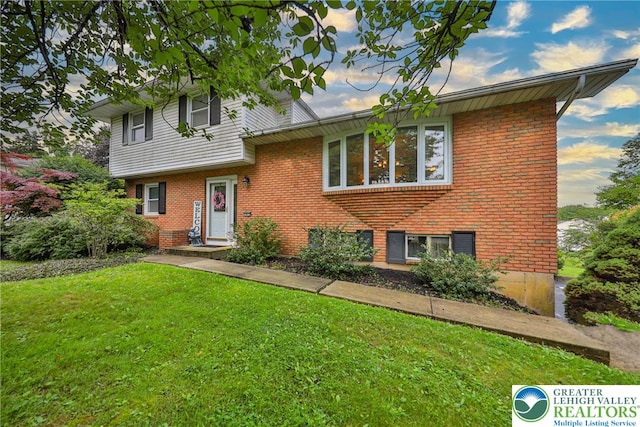 1812 Treeline Dr, Forks Twp, PA 18040 - view of front facade with a front lawn and brick siding
