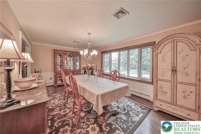1812 Treeline Dr, Forks Twp, PA 18040 - dining room with a baseboard heating unit, dark wood finished floors, a chandelier, and ornamental molding