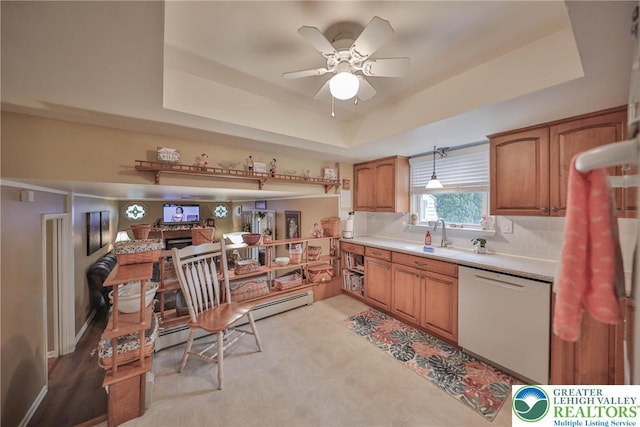 1812 Treeline Dr, Forks Twp, PA 18040 - kitchen featuring white dishwasher, light countertops, a ceiling fan, a tray ceiling, and brown cabinetry