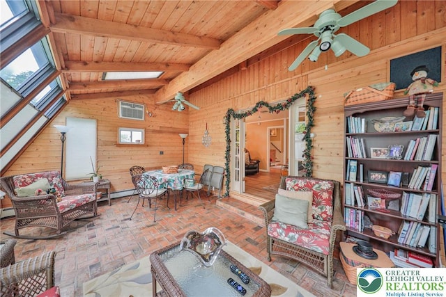 1812 Treeline Dr, Forks Twp, PA 18040 - living room featuring wood walls, ceiling fan, a skylight, plenty of natural light, and brick flooring
