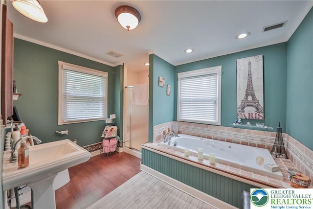 1812 Treeline Dr, Forks Twp, PA 18040 - full bath featuring wood finished floors, a stall shower, a garden tub, and recessed lighting