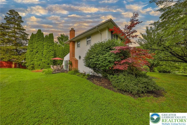 1812 Treeline Dr, Forks Twp, PA 18040 - view of side of home with a chimney