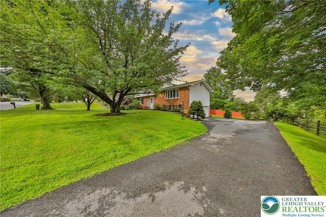 1812 Treeline Dr, Forks Twp, PA 18040 - view of front of home featuring driveway and brick siding