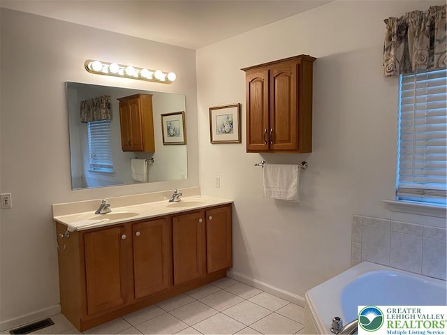 120 Palomino Cir, Washington Twp, PA 18013 - full bathroom featuring double vanity, tile patterned flooring, and a bath