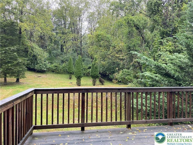 120 Palomino Cir, Washington Twp, PA 18013 - wooden deck with a yard and a wooded view