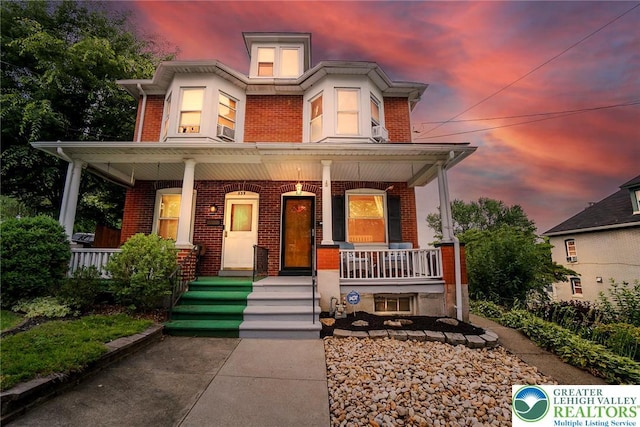 537 Seitz St, Easton, PA 18042 - view of front of property featuring brick siding and a porch