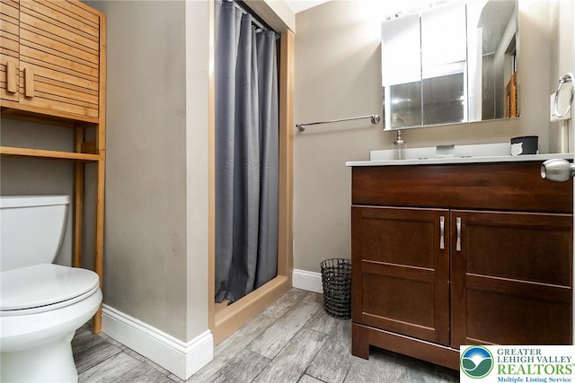 537 Seitz St, Easton, PA 18042 - bathroom with a shower stall, wood finished floors, and vanity