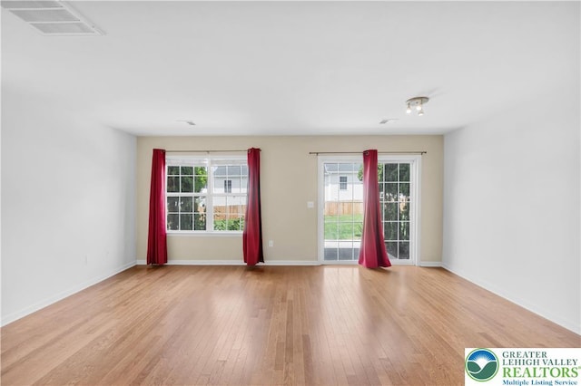 733 Trout Creek Ln, Allentown City, PA 18103 - spare room featuring wood finished floors and baseboards