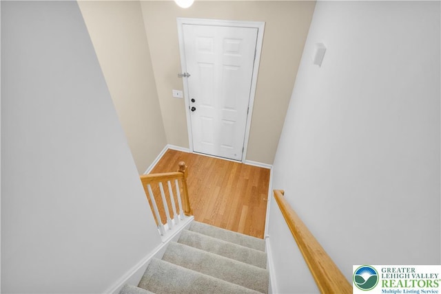 733 Trout Creek Ln, Allentown City, PA 18103 - stairway with wood finished floors and baseboards