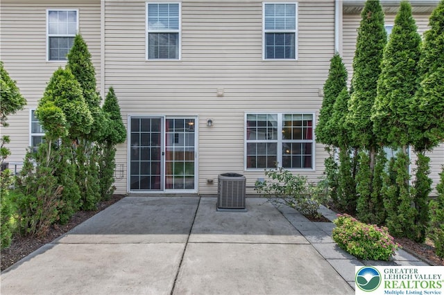 733 Trout Creek Ln, Allentown City, PA 18103 - rear view of property with a patio area