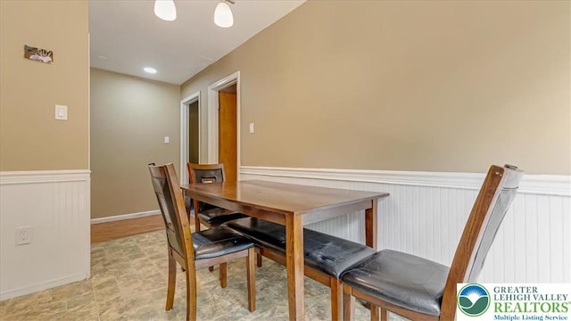 671 Dotters Corner Rd, Polk Twp, PA 18058 - dining area with a wainscoted wall
