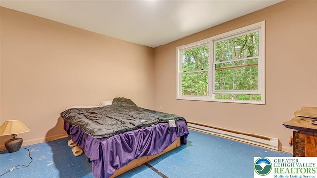 671 Dotters Corner Rd, Polk Twp, PA 18058 - carpeted bedroom with a baseboard heating unit and baseboards
