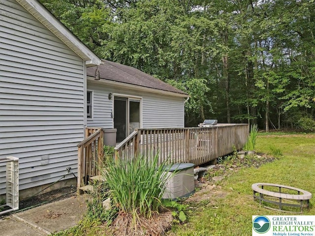 671 Dotters Corner Rd, Polk Twp, PA 18058 - view of grassy yard with a deck