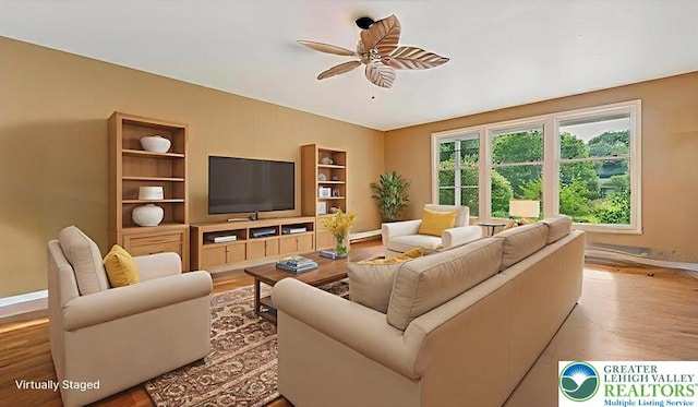 671 Dotters Corner Rd, Polk Twp, PA 18058 - living area featuring ceiling fan and wood finished floors