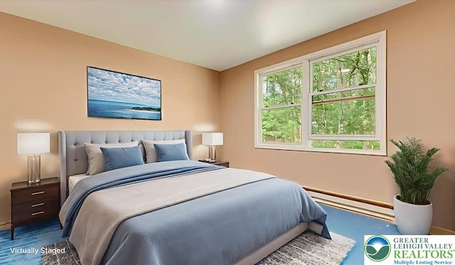 671 Dotters Corner Rd, Polk Twp, PA 18058 - bedroom featuring a baseboard heating unit and baseboards
