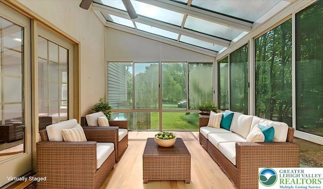 671 Dotters Corner Rd, Polk Twp, PA 18058 - sunroom with a skylight, an outdoor living space, and vaulted ceiling