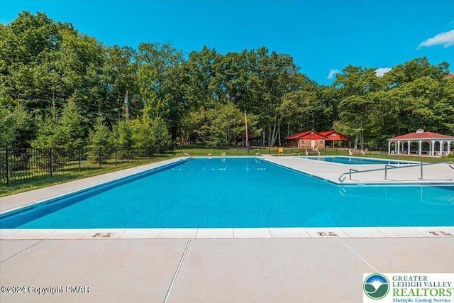 671 Dotters Corner Rd, Polk Twp, PA 18058 - community pool with a gazebo and a patio