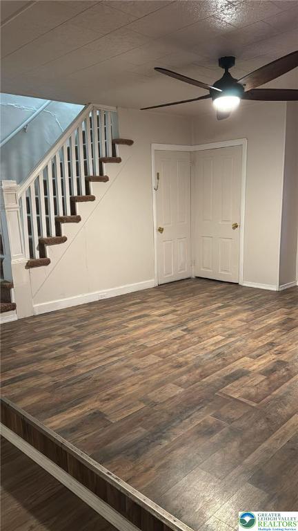 838 E Patterson St, Lansford Boro, PA 18232 - unfurnished living room with ceiling fan, wood finished floors, and stairway