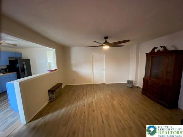 838 E Patterson St, Lansford Boro, PA 18232 - unfurnished living room with ceiling fan and wood finished floors