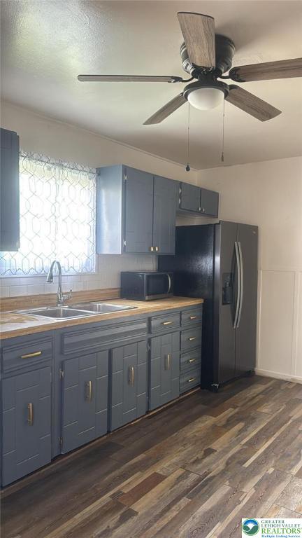 838 E Patterson St, Lansford Boro, PA 18232 - kitchen with dark wood finished floors, gray cabinets, ceiling fan, refrigerator with ice dispenser, and light countertops
