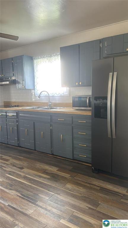 838 E Patterson St, Lansford Boro, PA 18232 - kitchen featuring appliances with stainless steel finishes, gray cabinetry, and dark wood-type flooring