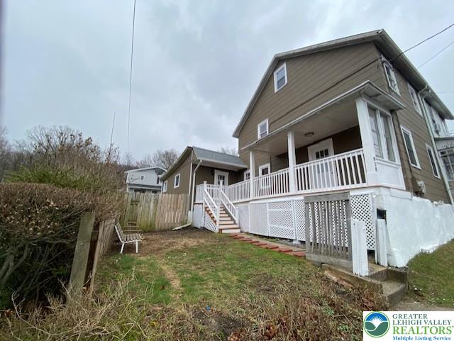 838 E Patterson St, Lansford Boro, PA 18232 - back of property featuring stairs and a porch