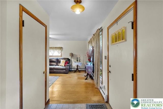1919 W Cedar St Unit 1919, Allentown City, PA 18104 - corridor featuring wood finished floors, a baseboard heating unit, and a baseboard radiator