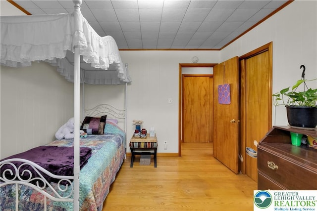 1919 W Cedar St Unit 1919, Allentown City, PA 18104 - bedroom with light wood-style flooring and ornamental molding