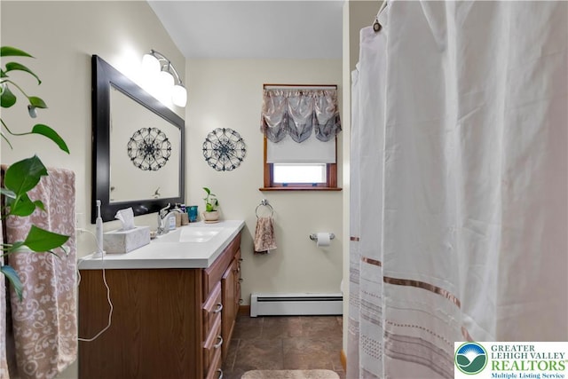 1919 W Cedar St Unit 1919, Allentown City, PA 18104 - bathroom with baseboard heating and vanity