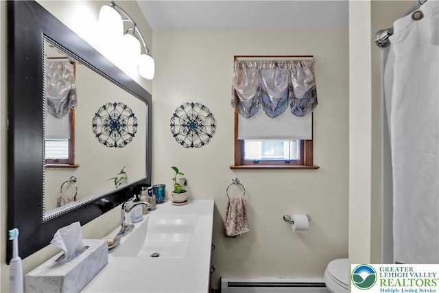 1919 W Cedar St Unit 1919, Allentown City, PA 18104 - full bathroom with a baseboard radiator and vanity