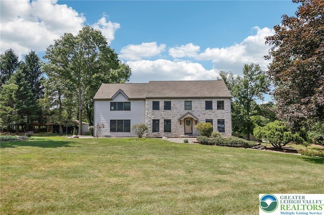 6365 Constitution Rd, Lowhill Twp, PA 18078 - colonial house with stone siding and a front lawn