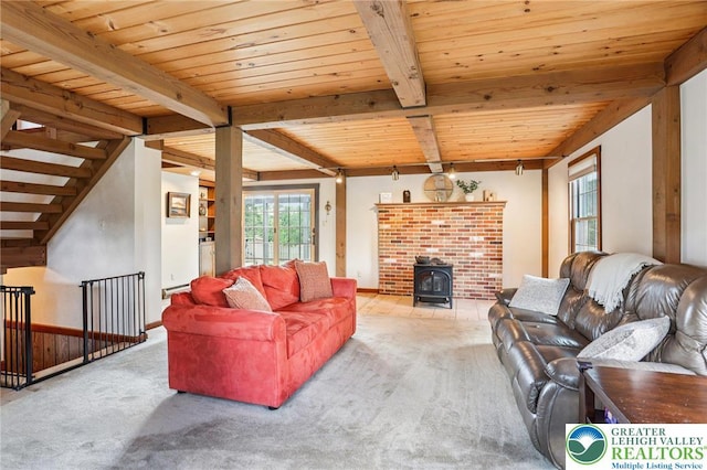 6365 Constitution Rd, Lowhill Twp, PA 18078 - carpeted living area with a wooden ceiling with exposed beams and a wood stove