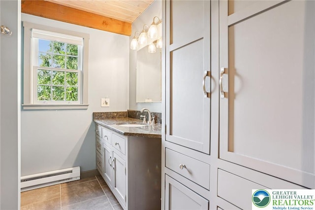 6365 Constitution Rd, Lowhill Twp, PA 18078 - bathroom featuring a baseboard heating unit, vanity, and tile patterned flooring