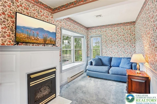 6365 Constitution Rd, Lowhill Twp, PA 18078 - living area featuring a baseboard heating unit, wallpapered walls, and a glass covered fireplace