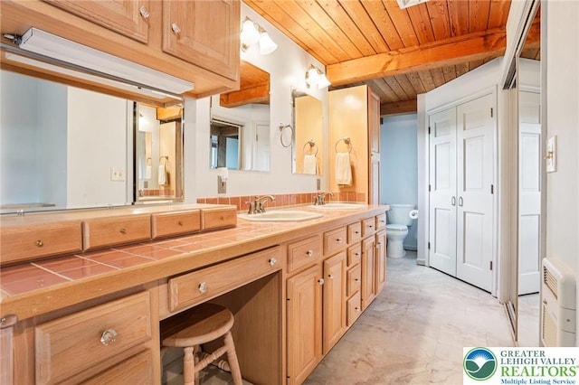 6365 Constitution Rd, Lowhill Twp, PA 18078 - bathroom featuring a wood ceiling with exposed beams, double vanity, and a closet
