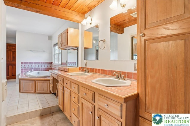 6365 Constitution Rd, Lowhill Twp, PA 18078 - full bath featuring double vanity, tile patterned flooring, a bath, wooden ceiling, and tasteful backsplash