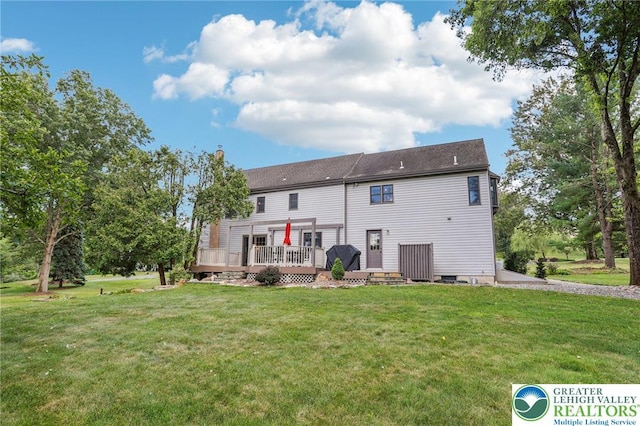 6365 Constitution Rd, Lowhill Twp, PA 18078 - back of house featuring a wooden deck and a lawn
