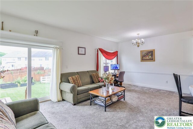 205 Maple Ct, Alburtis Boro, PA 18011 - living area featuring a chandelier and carpet