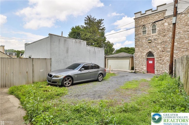 209 Cattell St, Easton, PA 18042 - view of vehicle parking with a detached garage
