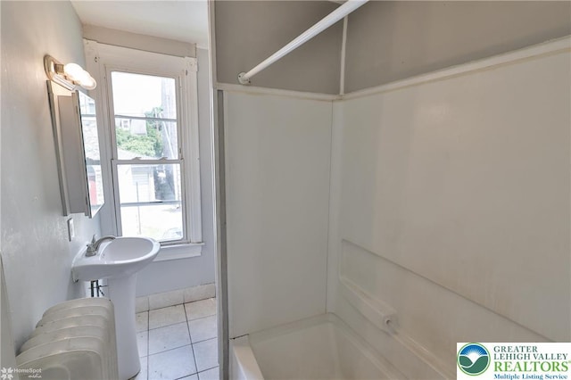 209 Cattell St, Easton, PA 18042 - full bath featuring tile patterned flooring, radiator, and shower / washtub combination